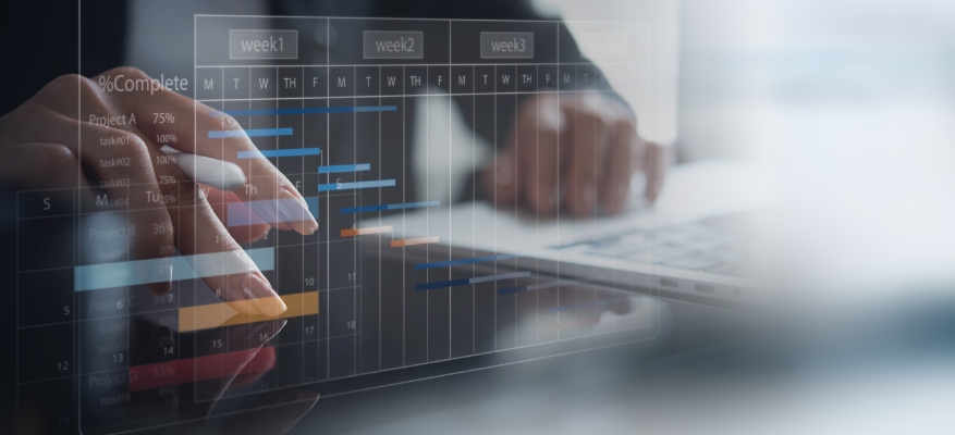 person using laptop with planning icons