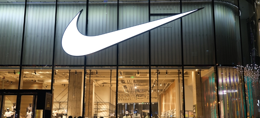 White Nike logo on black store front