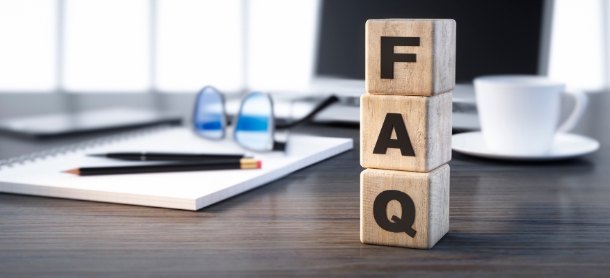 faq wooden blocks on top of table