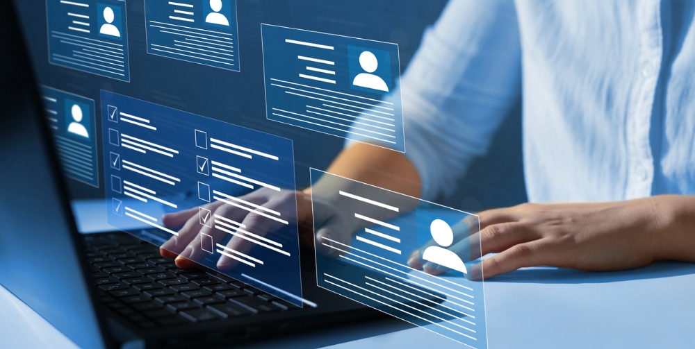 person typing on laptop with persona and bar chart graphics